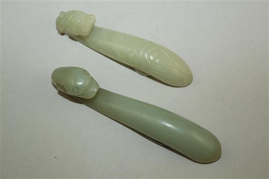 Two Chinese celadon jade belt hooks, 19th century, 11cm